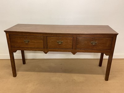Lot 711 - An 18th century oak dresser base with three...