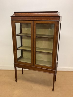 Lot 727 - An Edwardian inlaid mahogany display cabinet,...