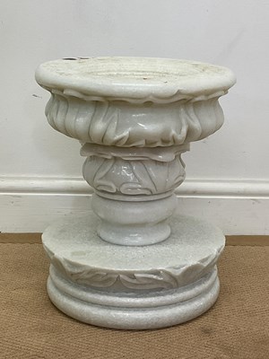 Lot 671 - A marble bird bath on a raised plinth, 37 x...