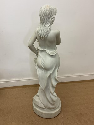 Lot 668 - A marble statue of a scantily clad woman...