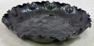 Lot 231 - An Arts and Crafts copper bowl, with textured...