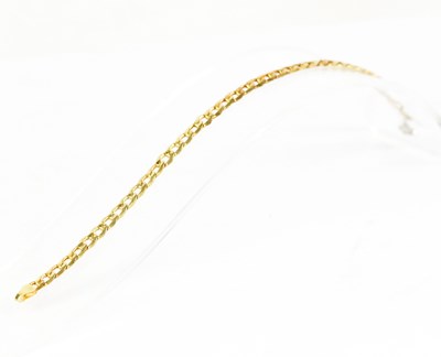 Lot 1408 - A 9ct yellow gold curb link bracelet, approx....
