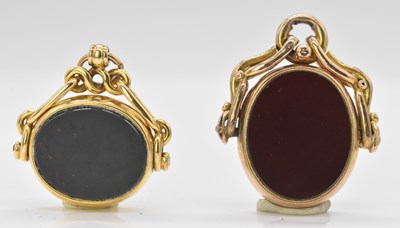 Lot 494 - An 18ct yellow gold mounted double sided...