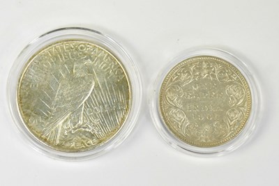 Lot 1208 - A Victorian one rupee, 1901, and a US peace...