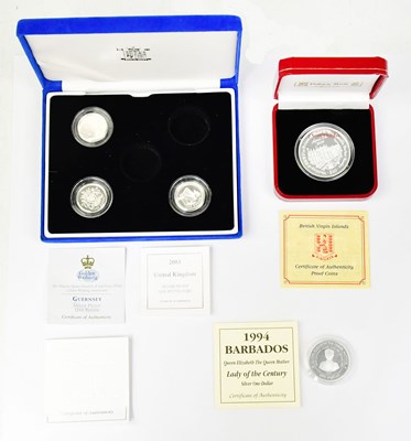 Lot 1226 - Three silver proof £1 coins, 1997, 2003 and...