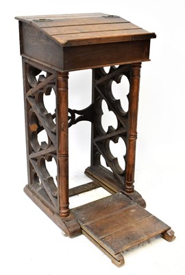 Lot 39 - A 19th century oak lectern with slope, on...