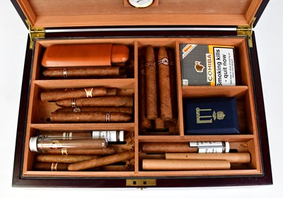 Lot 681 - A wooden cigar humidor, 13 x 46x 31cm, the top...