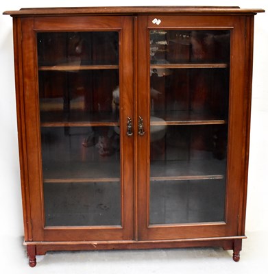 Lot 61 - An Edwardian mahogany glazed bookcase with...