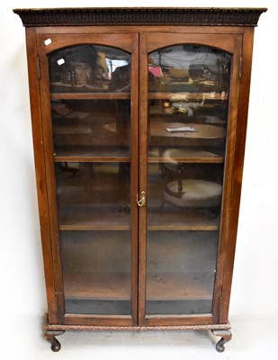 Lot 37 - An early 20th century mahogany glazed bookcase...