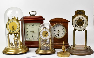Lot 76 - Three brass anniversary clocks, two under...