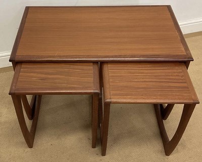 Lot 747 - A teak nest of tables, one long over two short,...
