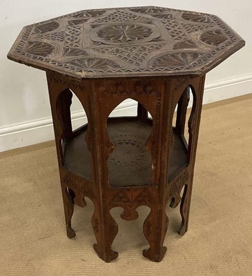 Lot 801 - A Moorish octagonal table with brass inlay top,...