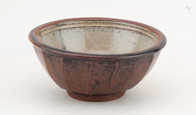 Lot 295 - JIM MALONE (born 1946); a faceted stoneware...