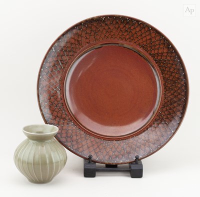 Lot 19 - ANDREW CROUCH (born 1955); a stoneware charger...