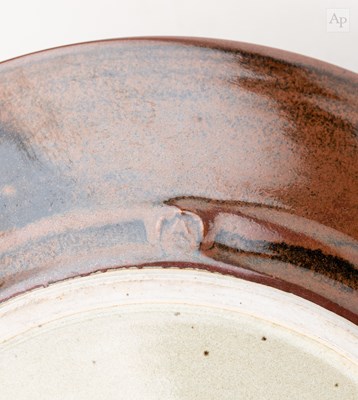 Lot 19 - ANDREW CROUCH (born 1955); a stoneware charger...