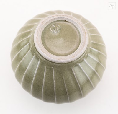 Lot 19 - ANDREW CROUCH (born 1955); a stoneware charger...