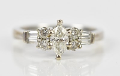 Lot 394 - A 9ct white gold diamond set dress ring, with...