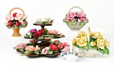 Lot 123 - CAPODIMONTE; a wooden display of twelve...