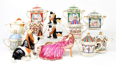 Lot 682 - A collection of teapots, to include Sadler,...
