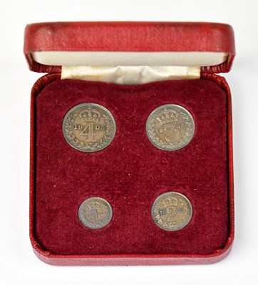 Lot 1209 - A cased set of Edward VII Maundy money dated...