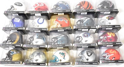Lot 542 - NFL; twenty-eight mini-helmets from various...