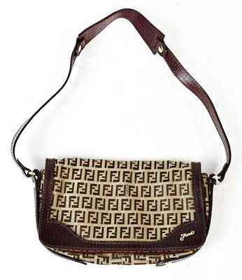 Lot 548 - FENDI; a small brown leather and canvas...