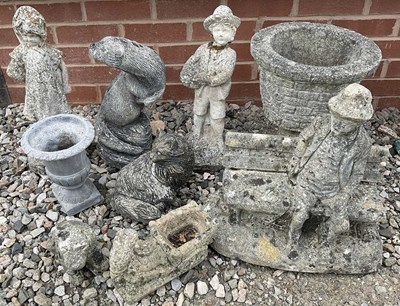 Lot 675 - Composite stone garden ornaments, including a...