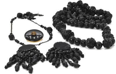 Lot 513 - A Whitby jet carved necklace, length approx...