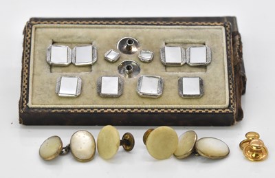 Lot 546 - A cased set of sterling silver backed mother...