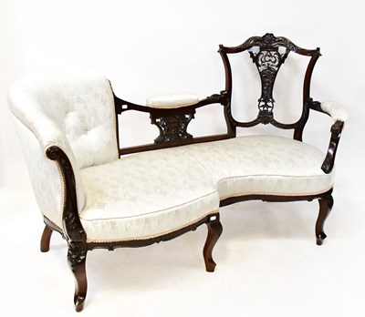 Lot 37 - A Victorian mahogany framed settee of shaped...