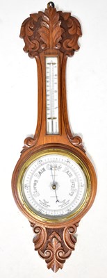 Lot 103 - MILLER & CO; a Victorian oak aneroid...