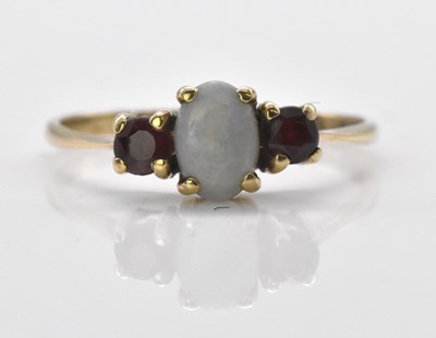 Lot 497 - A 9ct yellow gold opal and garnet graduated...