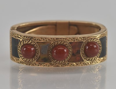 Lot 1201 - A yellow metal carnelian set tie clip, set...