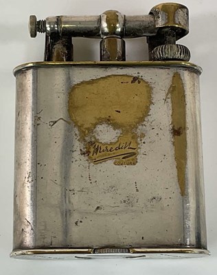 Lot 26 - DUNHILL; a large silver plated lighter, with...