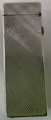 Lot 444 - DUNHILL; a 1950s Swiss made silver lighter of...