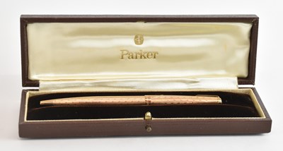 Lot 1190 - PARKER; a 9ct gold bodied ballpoint pen, the...