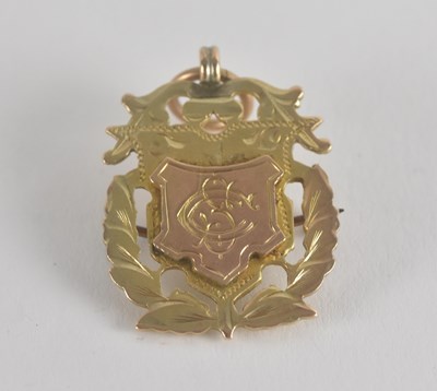 Lot 1474 - A 9ct gold golfing prize fob shield made into...