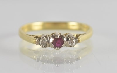 Lot 1323 - An 18ct gold ruby and diamond set ring, the...