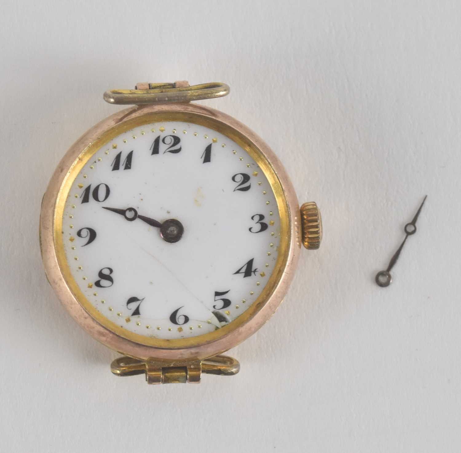 Lot 1745 - A lady's 9ct gold watch head with crown wind...