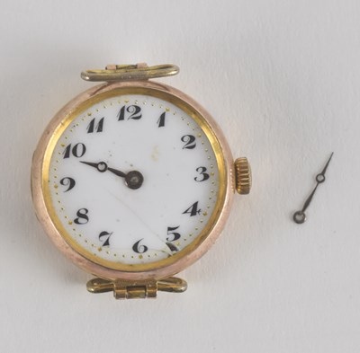 Lot 1745 - A lady's 9ct gold watch head with crown wind...
