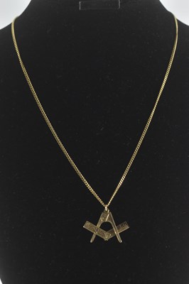 Lot 1413 - A 9ct gold Masonic pendant comprising a...
