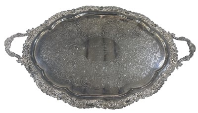 Lot 1020 - A large oval silver plated tray with scalloped...
