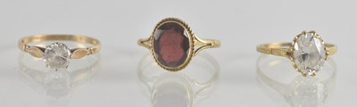 Lot 1285 - Three 9ct gold dress rings comprising one with...