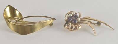 Lot 1483 - Two gold brooches, one in the form of a...
