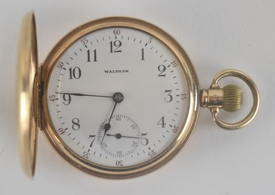 Lot 1703 - WALTHAM; a 9ct gold full hunter pocket watch,...