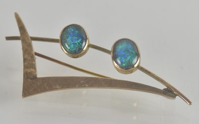 Lot 1471 - A 9ct gold and opal set brooch of contemporary...
