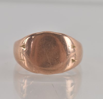 Lot 1328 - A 9ct rose gold signet ring, size T, approx 5.5g.