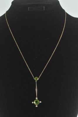 Lot 1432 - A gold coloured metal necklace, with two cut...