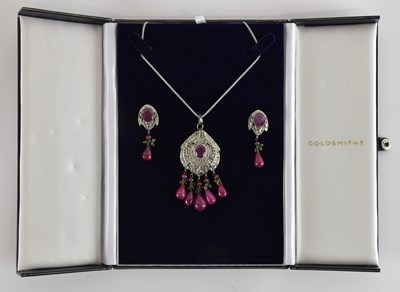 Lot 1377 - A ruby, diamond and emerald set pendant and...