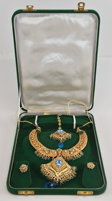 Lot 1392 - A Middle Eastern parure of gilt metal...